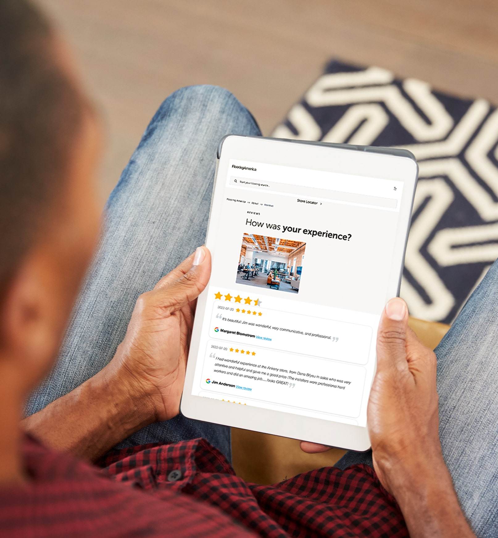Person looking at flooring store reviews on tablet